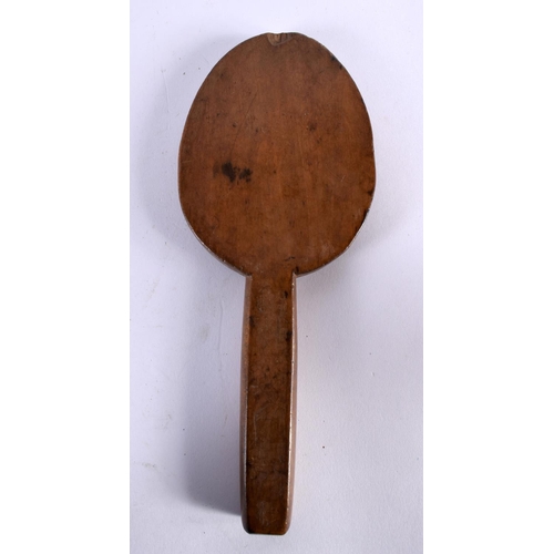 582 - A TREEN BUTTER BOWL with spoon. Largest 24 cm diameter. (2)