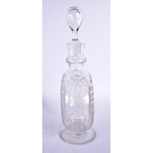 59 - A FRENCH BACCARAT GLASS DECANTER AND STOPPER. 28cm high.