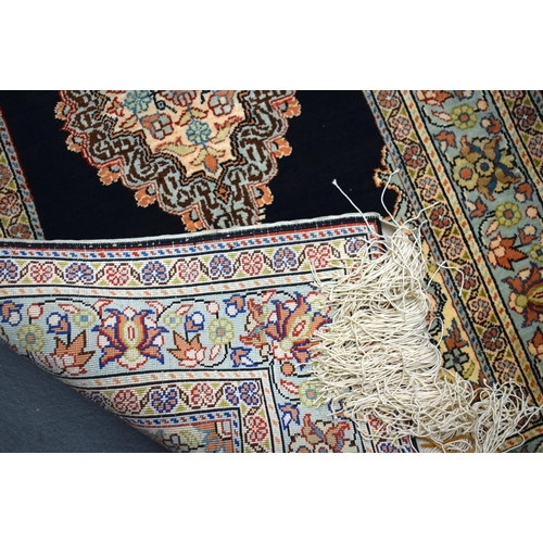 592 - A KAYSER SILK PRAYER RUG. 100 cm x 50 cm.