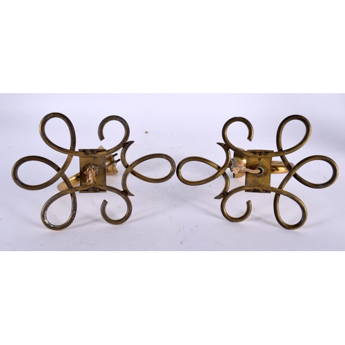 593 - A PAIR OF VINTAGE BRASS WALL APPLIQUES. 15cm x 10 cm.