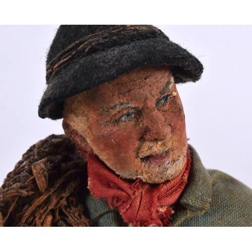 600 - A PAIR OF FOLK ART MAQUETTES OF BRETON PEOPLE by Jules Charles La Brazer. 33 cm high.