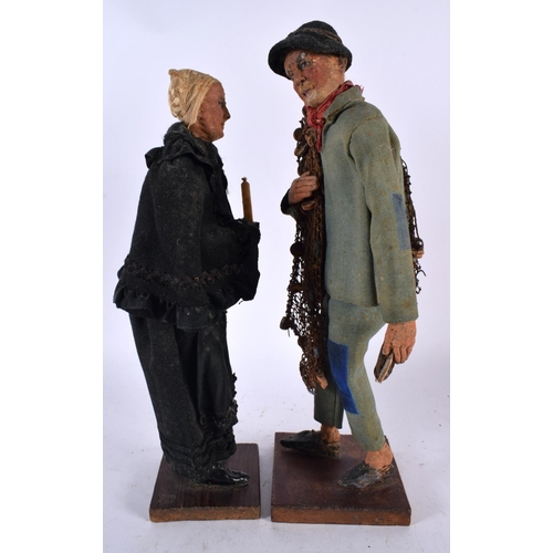 600 - A PAIR OF FOLK ART MAQUETTES OF BRETON PEOPLE by Jules Charles La Brazer. 33 cm high.