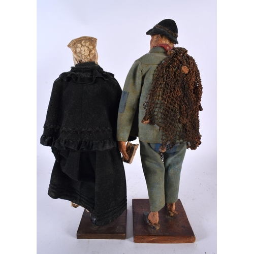 600 - A PAIR OF FOLK ART MAQUETTES OF BRETON PEOPLE by Jules Charles La Brazer. 33 cm high.