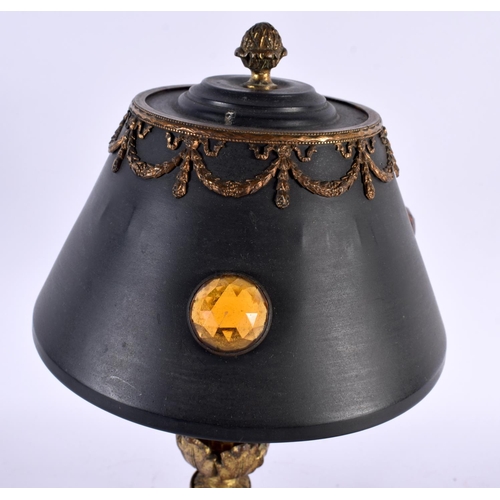 606 - A 19TH CENTURY FRENCH EMPIRE GILDED METAL CABOCHON LAMP. 32 cm high.