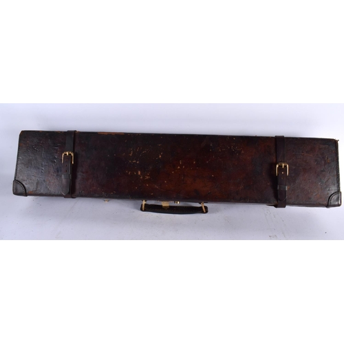 607 - A VINTAGE LEATHER GUN CASE. 85 cm x 20cm.