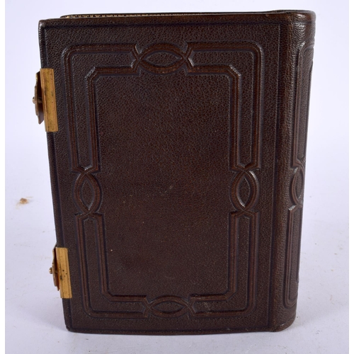 609 - AN UNUSUAL VICTORIAN HIDDEN COMPARTMENT PHOTOGRAPH ALBUM. 15cm x 12 cm.