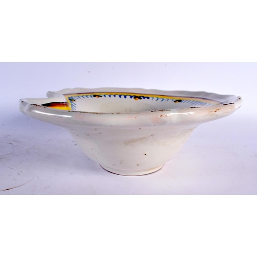 61 - AN ANTIQUE FRENCH FAIENCE TIN GLAZED POTTERY BARBERS BOWL painted with flowers. 27 cm x 22cm.