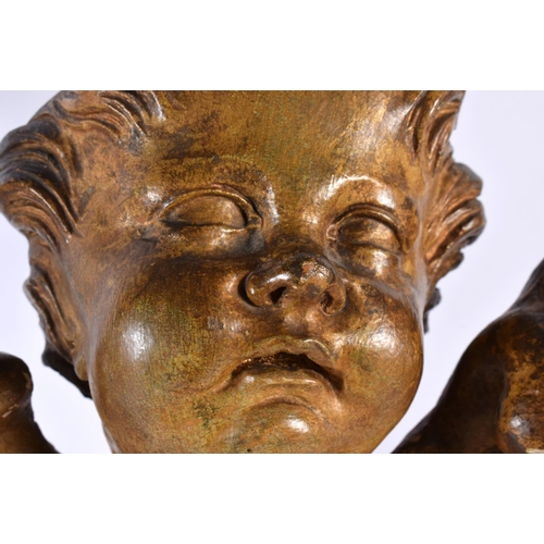 611 - A PAIR OF 17TH/18TH CENTURY CONTINENTAL GESSO GILTWOOD PUTTI FIGURES. Largest 46 cm x 24 cm.