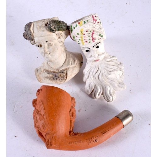 615 - A COLLECTION OF 19TH CENTURY CLAY PIPES in various forms and sizes, including politicians etc. (43)