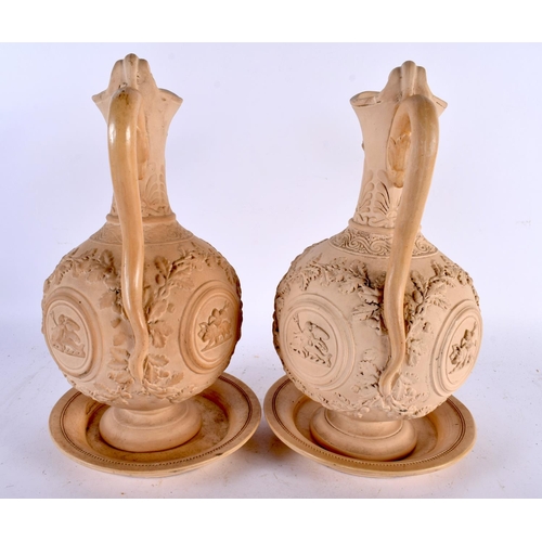 616 - A LARGE PAIR OF 19TH CENTURY EUROPEAN POTTERY EWERS AND COVERS with stands, of NEOCLASSICAL form. 29... 