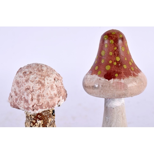 633 - TWO FOLK ART CARVED AND PAINTED WOOD MUSHROOM SPECIMENS. 14cm high. (2)