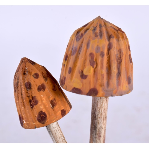 635 - TWO FOLK ART CARVED AND PAINTED WOOD MUSHROOM SPECIMENS. 14cm high. (2)