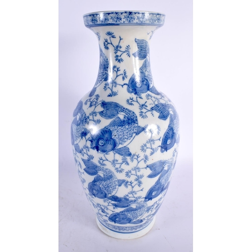 64 - A CHINESE REPUBLICAN PERIOD BLUE AND WHITE PORCELAIN VASE decorated with carp. 35 cm high.