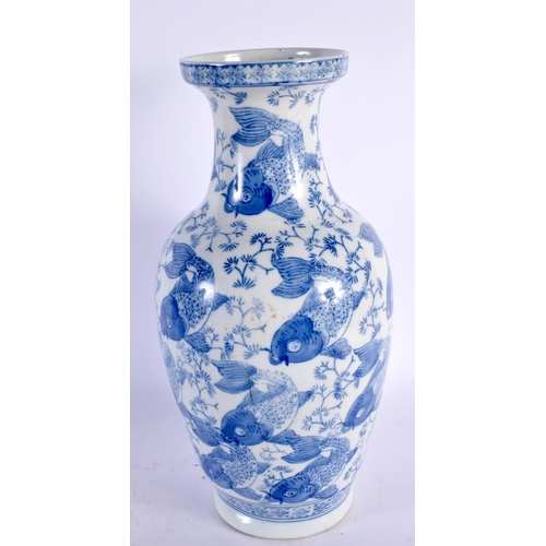 64 - A CHINESE REPUBLICAN PERIOD BLUE AND WHITE PORCELAIN VASE decorated with carp. 35 cm high.