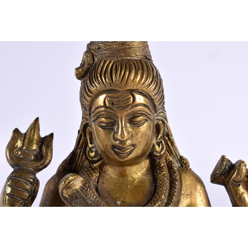 646 - A 19TH CENTURY INDIAN BRONZE HINDU FIGURE OF SHIVA  modelled seated on a lion skin with vasuki, king... 