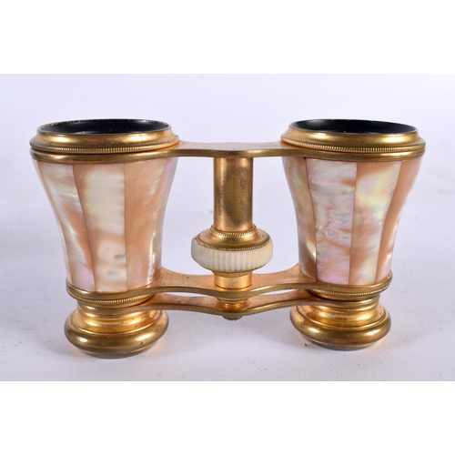 647 - A PAIR OF ANTIQUE FRENCH MOTHER OF PEARL OPERA GLASSES in original Swiss retailers case. 8.5 cm x 6.... 