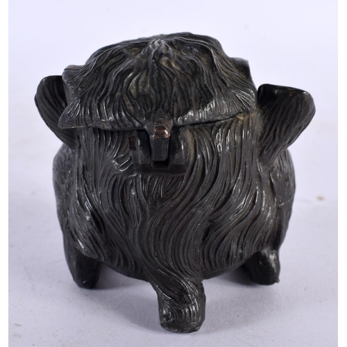 648 - A SMALL 19TH CENTURY CONTINENTAL INKWELL AND COVER possibly bronze, formed as a grotesque mask head.... 