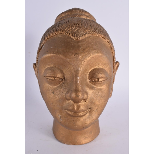 65 - A STUDIO POTTERY GOLD LACQUERED POTTERY BUST OF A BUDDHA. 22cm x 10 cm.