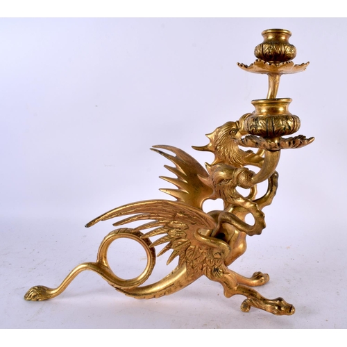 652 - A 19TH CENTURY GILT BRONZE CANDELABRA in the form of a three headed griffin with wings of a phoenix,... 