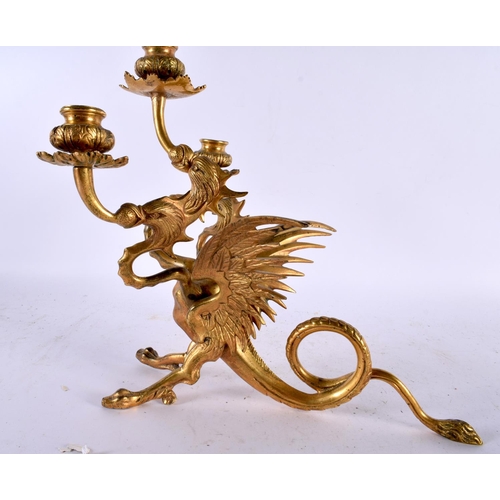 652 - A 19TH CENTURY GILT BRONZE CANDELABRA in the form of a three headed griffin with wings of a phoenix,... 