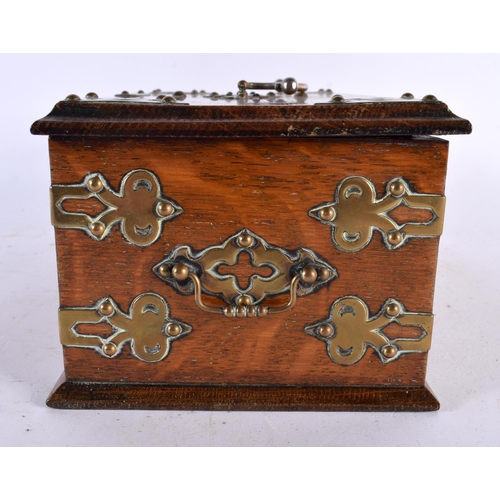 654 - A VICTORIAN BRASS MOUNTED OAK CIGAR BOX with two compartments, Rg Design 100157 C1888. 28cm x 12 cm.