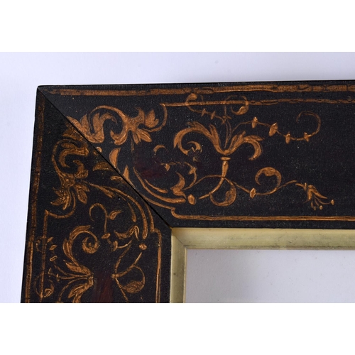 655 - AN EARLY 19TH CENTURY PAINTED AND LACQUERED ROSEWOOD PICTURE FRAME decorated with pen work flowers a... 