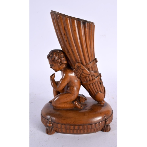 658 - A FINE 18TH CENTURY CONTINENTAL CARVED FRUITWOOD SPILL VASE modelled as a nude male kneeling with a ... 