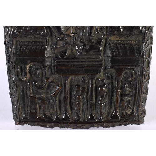 661 - A 17TH/18TH CENTURY EUROPEAN BRONZE PANEL OF A FEMALE SAINT modelled amongst other figures and build... 