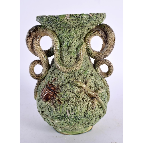 67 - A 19TH CENTURY PORTUGUESE MAJOLICA TWIN HANDLED MAFRA POTTERY VASE decorated with snakes and serpent... 