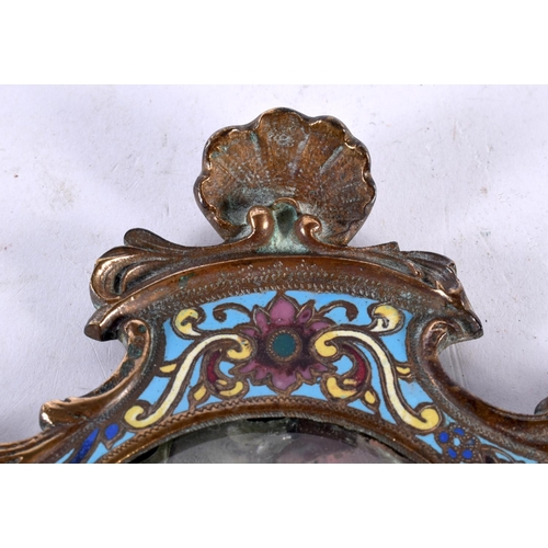 675 - A 19TH CENTURY FRENCH CHAMPLEVE ENAMEL BRONZE MIRROR decorated with foliage and vines. 30cm x 12 cm.