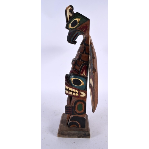 678 - A NORTH AMERICAN CANADIAN INUIT MARLIN NORTHWEST COAST TOTEM by Marlin Alphonse. 32 cm x 24 cm.