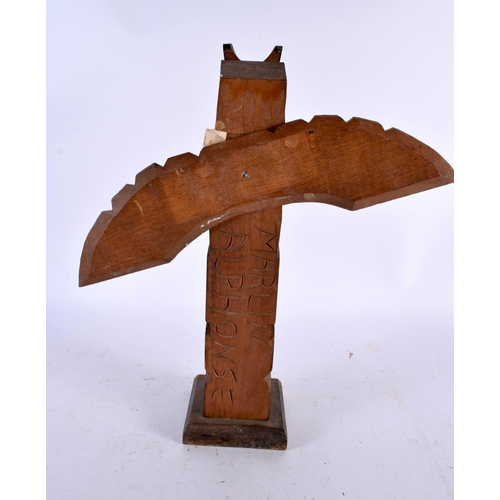 678 - A NORTH AMERICAN CANADIAN INUIT MARLIN NORTHWEST COAST TOTEM by Marlin Alphonse. 32 cm x 24 cm.