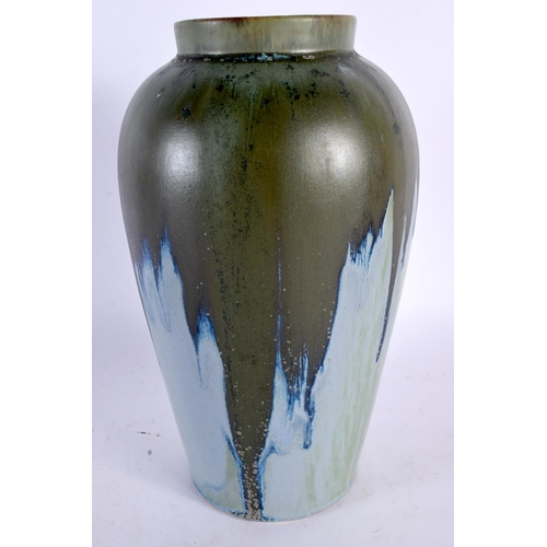 68 - A STUDIO POTTERY HIGH FIRED RUSKIN STYLE VASE possibly Denby. 24 cm high.