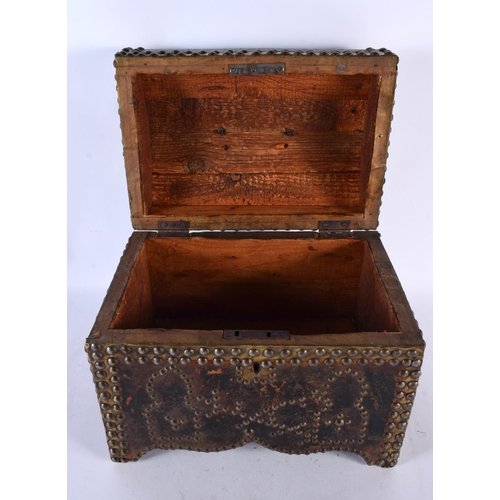 681 - A LARGE 19TH CENTURY COUNTRY HOUSE EUROPEAN LEATHER STUD WORK CASKET decorated with motifs. 32 cm x ... 