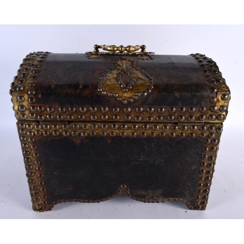 681 - A LARGE 19TH CENTURY COUNTRY HOUSE EUROPEAN LEATHER STUD WORK CASKET decorated with motifs. 32 cm x ... 