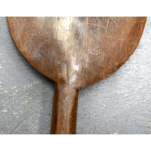 686 - A HEAVY HARDWOOD SOUTHSEA ISLANDS POLYNESIAN CARVED WOOD PADDLE. 150 cm long.