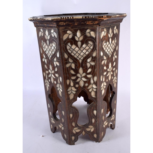 687 - A 19TH CENTURY MIDDLE EASTERN MOTHER OF PEARL INLAID TABLE with bone decoration to the sies. 48 cm x... 