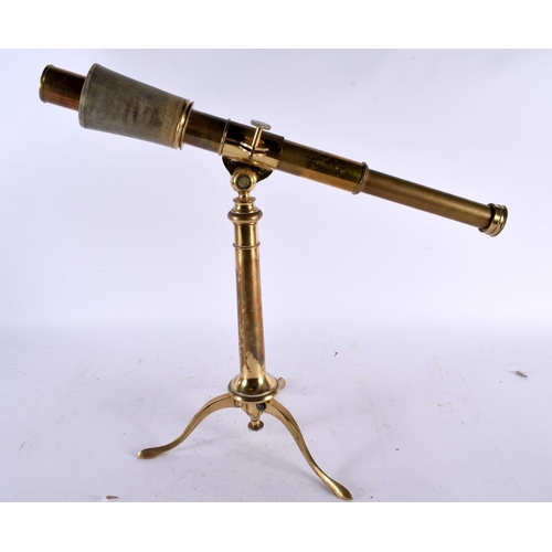 688 - A GEORGE III BRASS TELESCOPE. 47 cm x 42 cm.