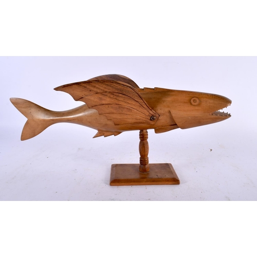 689 - A PITCAIRN ISLANDS FIGURE OF A FLYING FISH Sam Young. 37 cm wide.