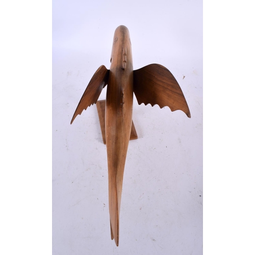 689 - A PITCAIRN ISLANDS FIGURE OF A FLYING FISH Sam Young. 37 cm wide.