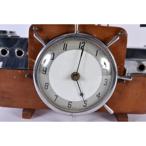 699 - A 1950S RETRO CHROME MARITIME SAILING BOAT MANTEL CLOCK with ships wheel dial. 44 cm x 32 cm.