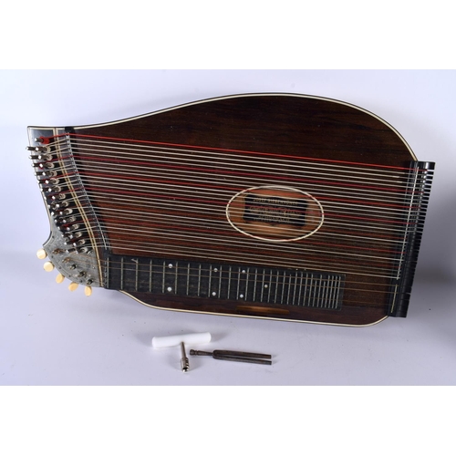 703 - AN AUSTRIAN CONCERT ZITHER by Josef Sibenhuner. 58 cm x 35 cm.