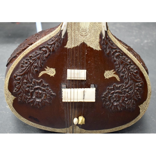 705 - A FINE EARLY 20TH CENTURY INDIAN KANAILAL & BROTHER OF CALCUTTA SITAR wonderfully carved all over wi... 