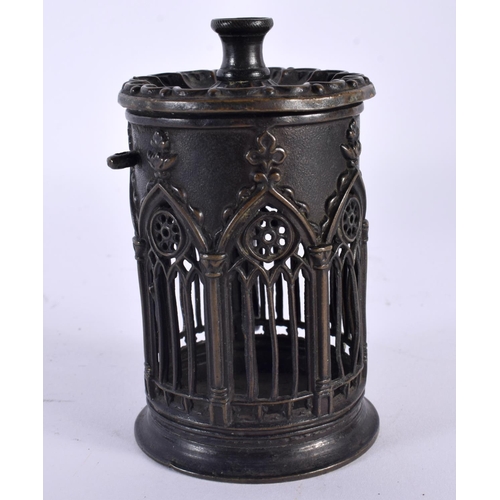 708 - AN UNUSUAL 19TH CENTURY GOTHIC REVIVAL BRONZE NIGHT LIGHT. 10 cm high.