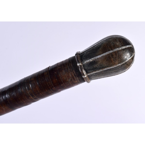 712 - AN EARLY 19TH CENTURY HORN HANDLED TAPERING WALKING CANE. 89 cm long.