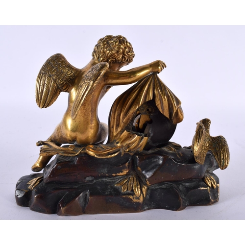 714 - AN EARLY 19TH CENTURY FRENCH GILT BRONZE MOUNTED CLOCK modelled as a puttu beside a bird. 15cm x 12 ... 