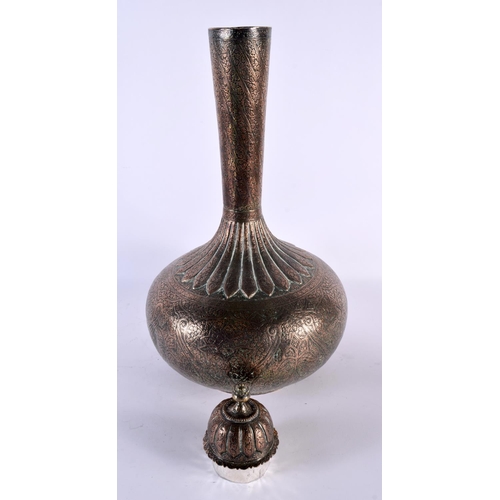 723 - A VERY LARGE 19TH CENTURY MIDDLE EASTERN COPPER ALLOY BULBOUS VASE decorated with foliage and vines.... 