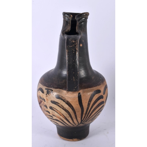 724 - A 4TH CENTURY BC GREEK GNATHIAN POTTERY WINE JUG. 23 cm high.