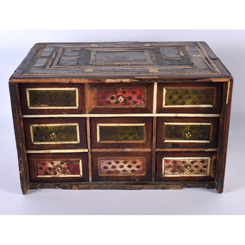 725 - A 17TH/18TH CENTURY PERSIAN MIDDLE EASTERN TORTOISESHELL TABLE CABINET inlaid with bone. 30cm x 22cm... 