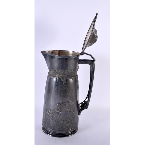 726 - A LARGE EARLY 20TH CENTURY ORIVIT PEWTER TANKARD decorated in relief with hunting scenes. 36 cm high... 